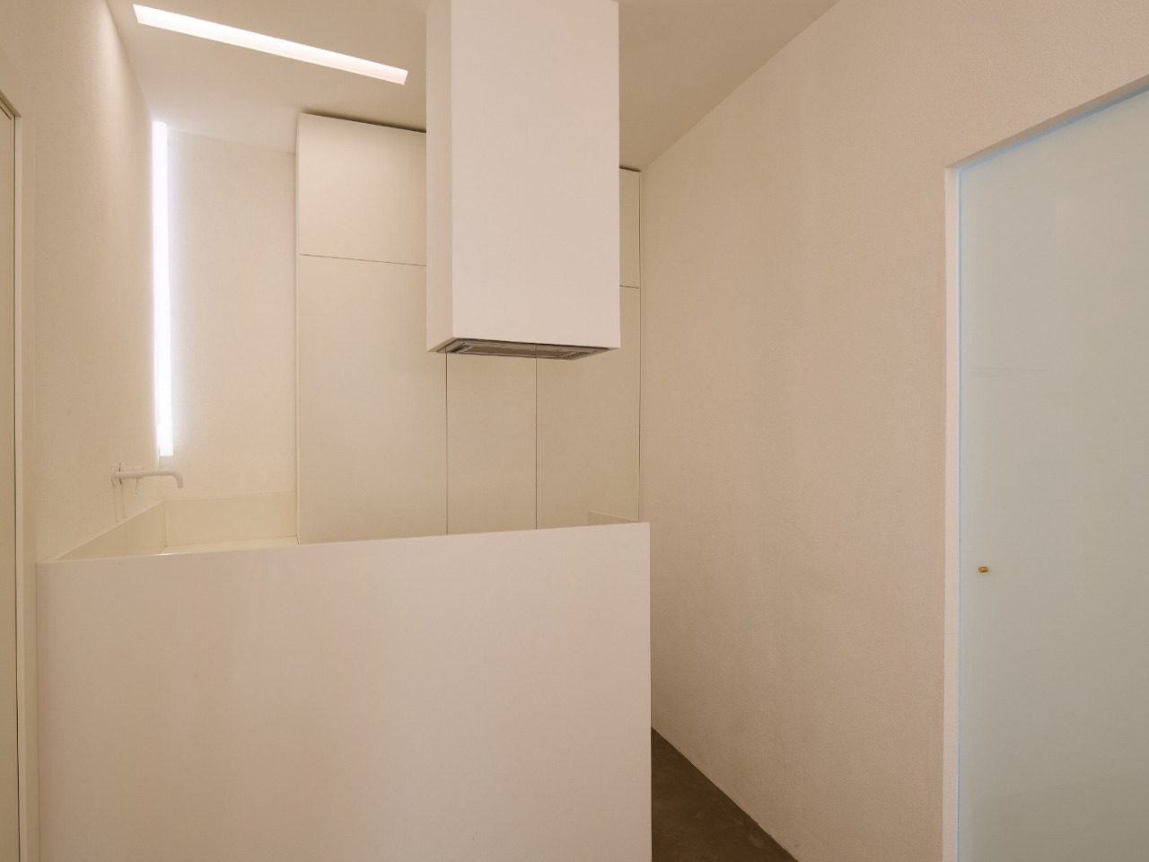 Modern corner of the kitchen in the Aurea apartment, Ortigia, Syracuse