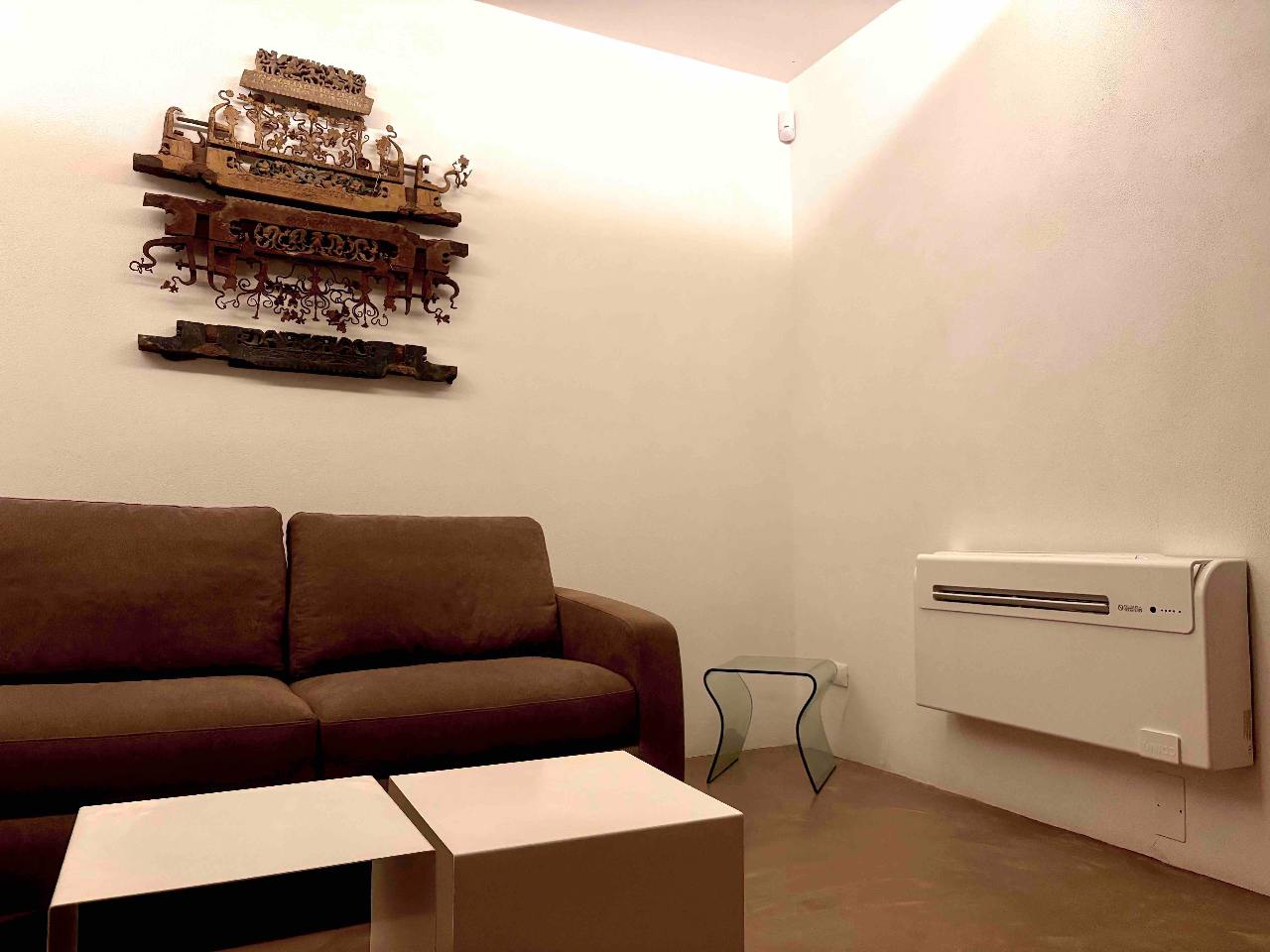 Interior view of the elegant living room in Aurea apartment, Ortigia, Syracuse