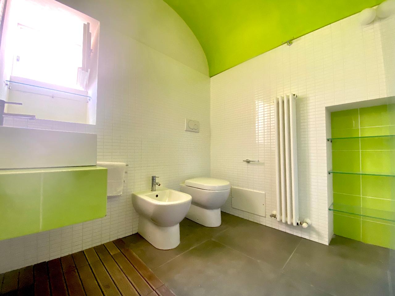 Refined details of the bathroom in the Kleomene apartment, Ortigia, Syracuse