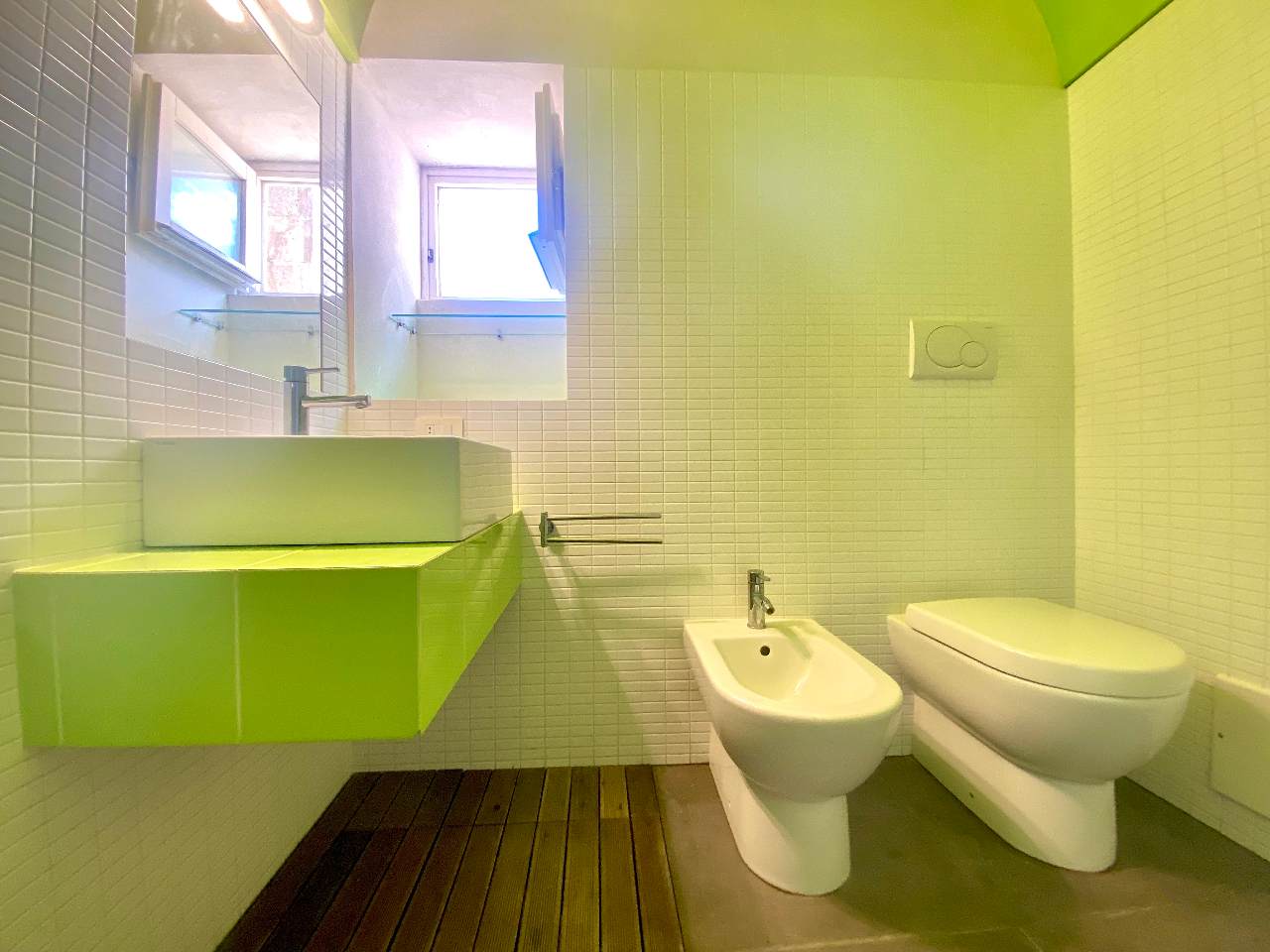 Modern bathroom with shower in the Kleomene apartment, Ortigia, Syracuse