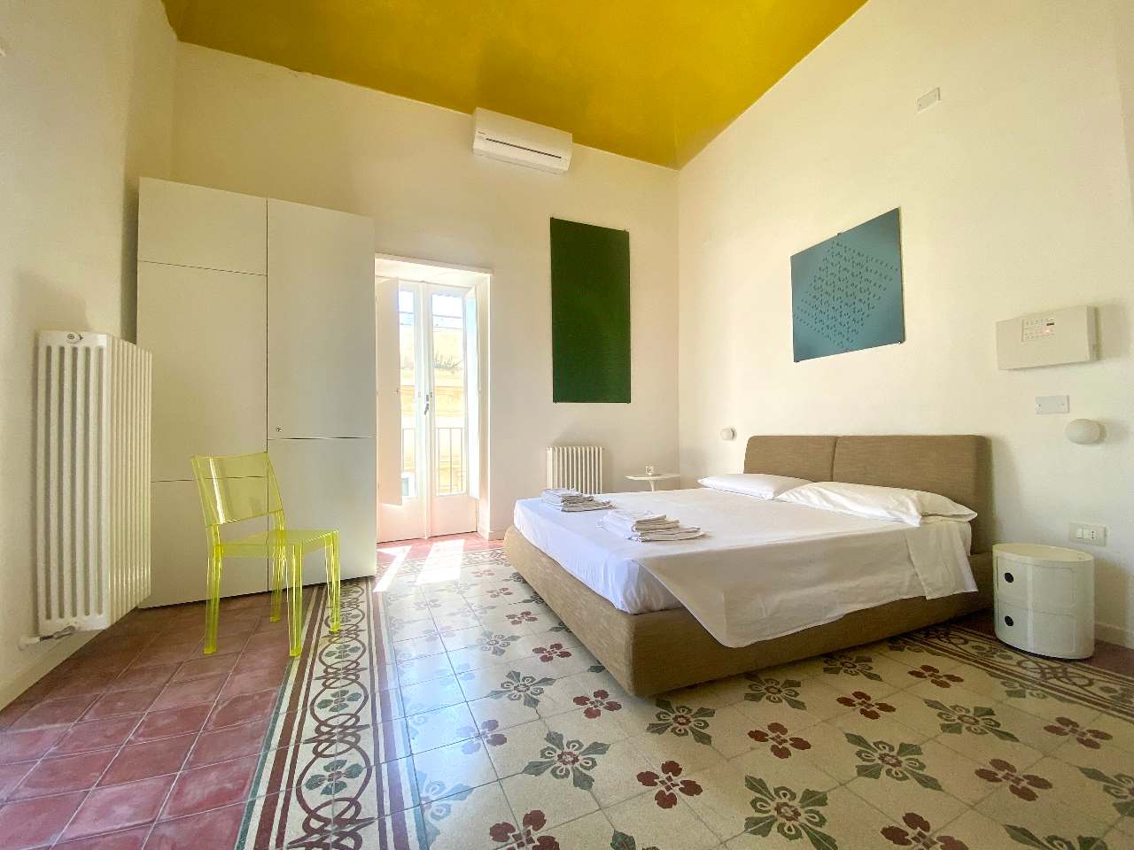 Spacious double bedroom of the Kleomene apartment in the heart of Ortigia